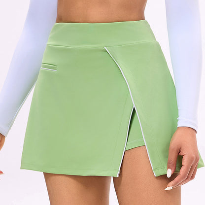 Women’s light green tennis skirt with front slit and side panel stitching