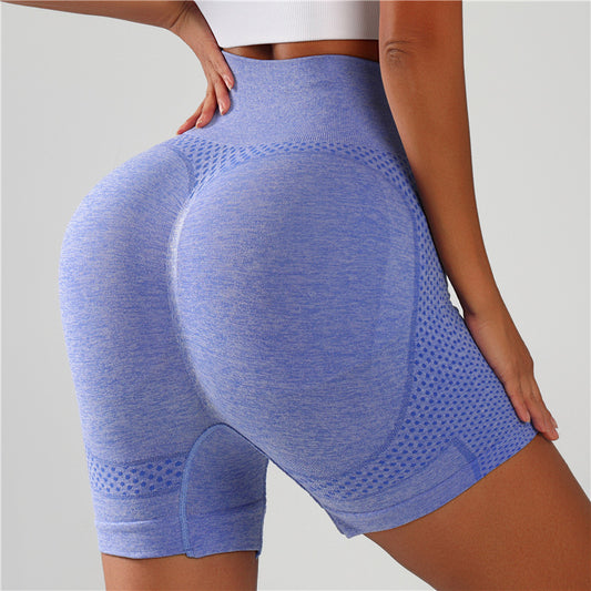Lavender purple high-waisted gym shorts with textured mesh panels, rear view