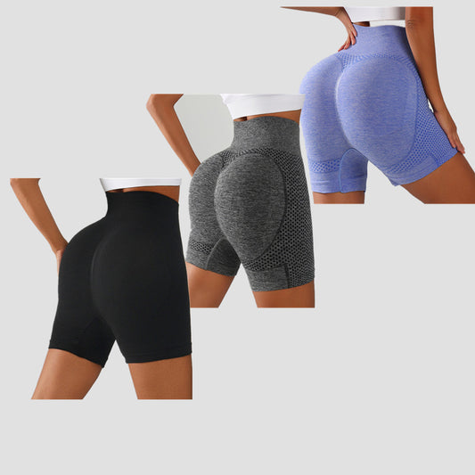 High-waisted gym shorts in black, gray, and lavender purple set