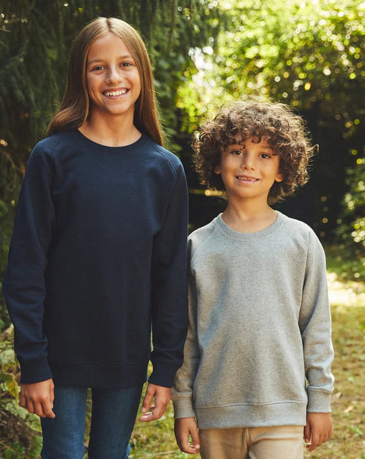 Kids sweatshirt in dark navy with crew neck and long sleeves, worn by a child