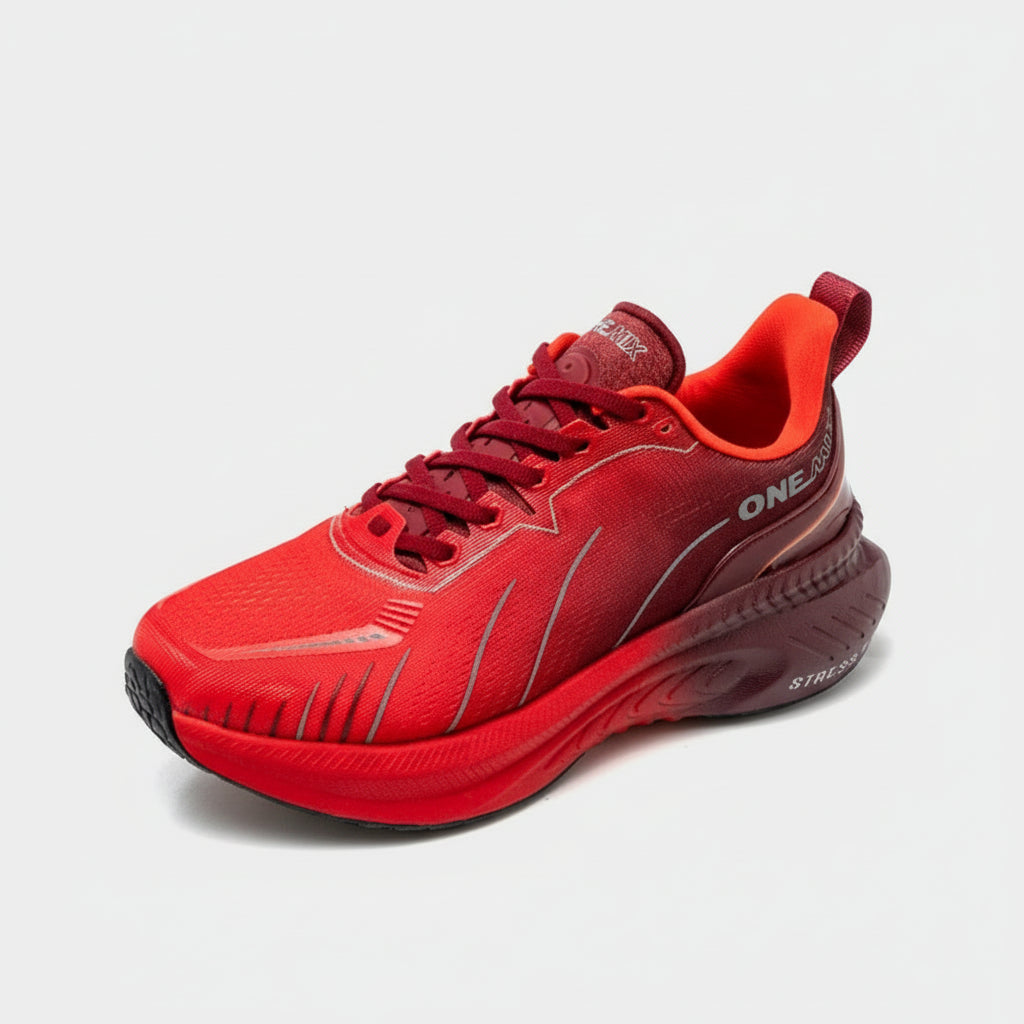 Red running shoes with black sole on a white background