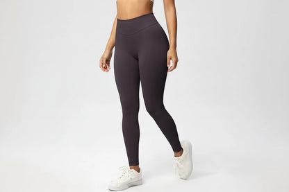 Black leggings worn by a person on a white background