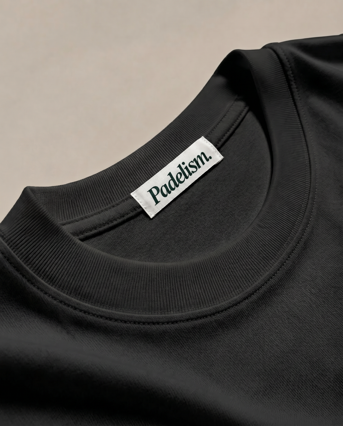 Heavyweight T-shirt in black with ribbed crew neck and Padelism label at chest