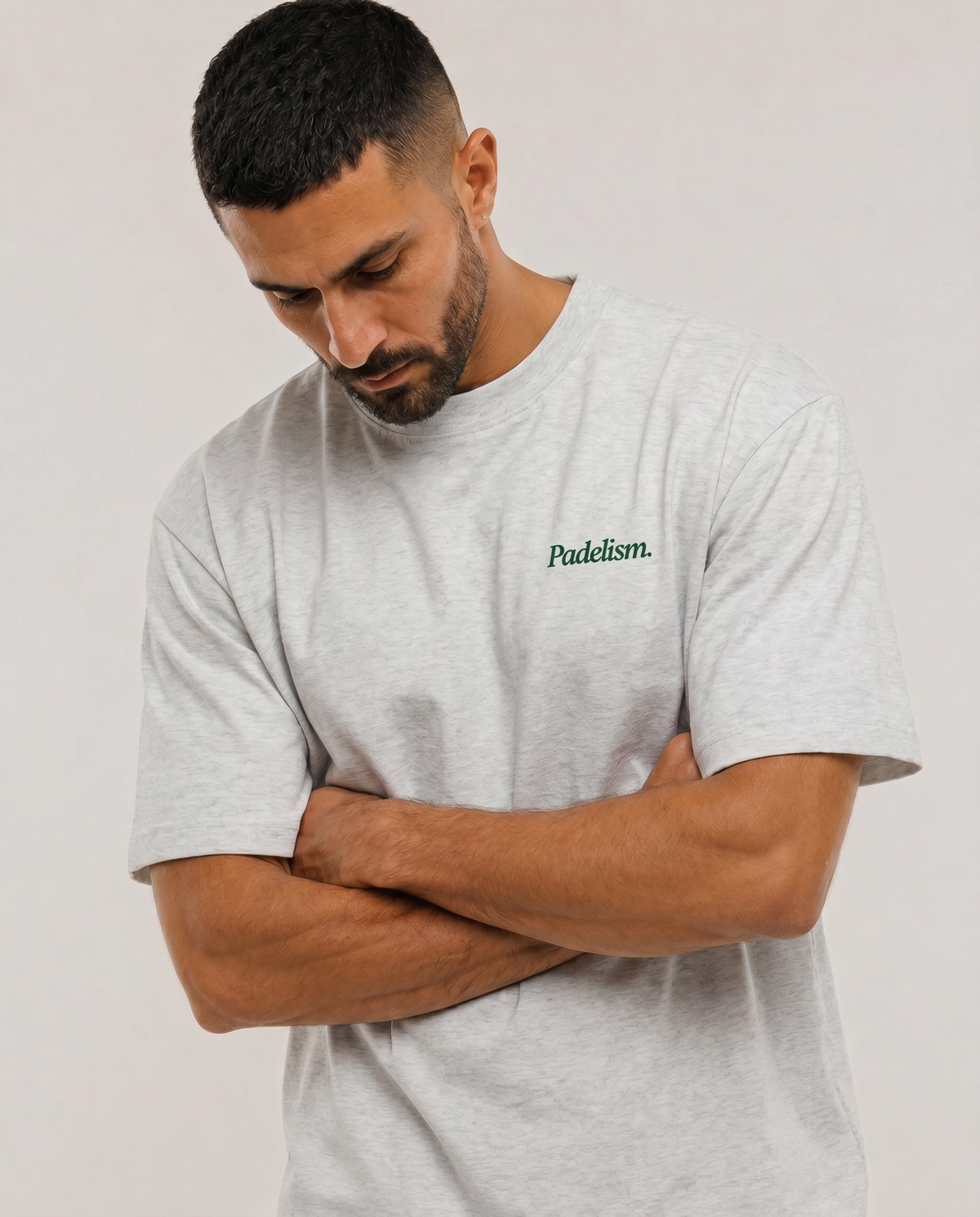 Gray heavyweight t-shirt with small “Padelism.” logo on the chest