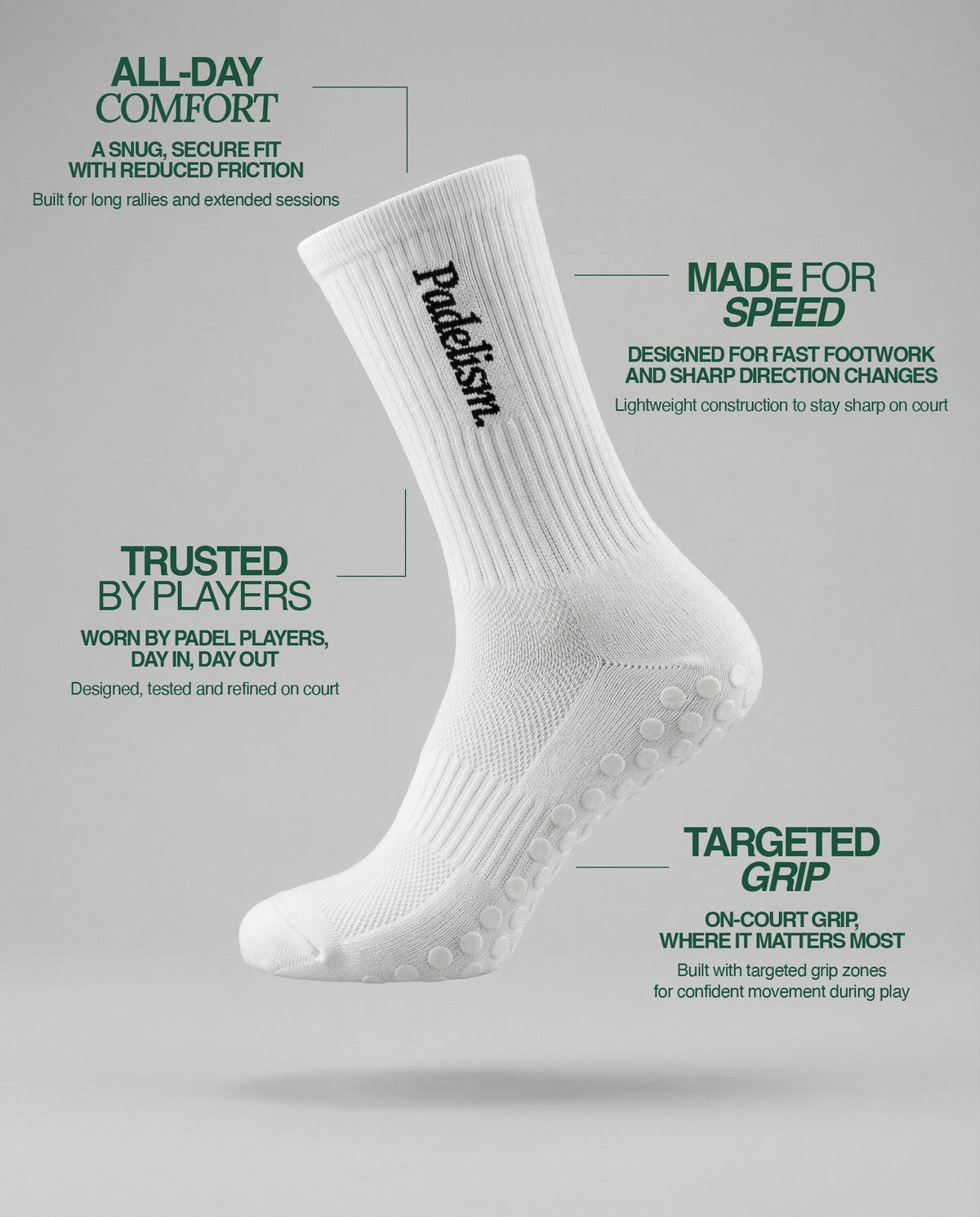 White crew socks with ribbed knit and dotted non-slip grip sole