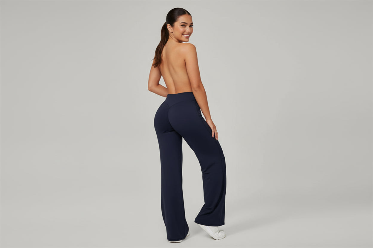 Navy blue leggings with a brand logo on a gray background