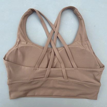 Taupe cross-back padded sports bra with crisscross racer back straps