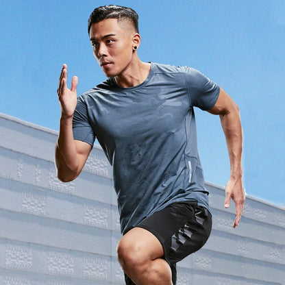 Man running outdoors with a clear blue sky background