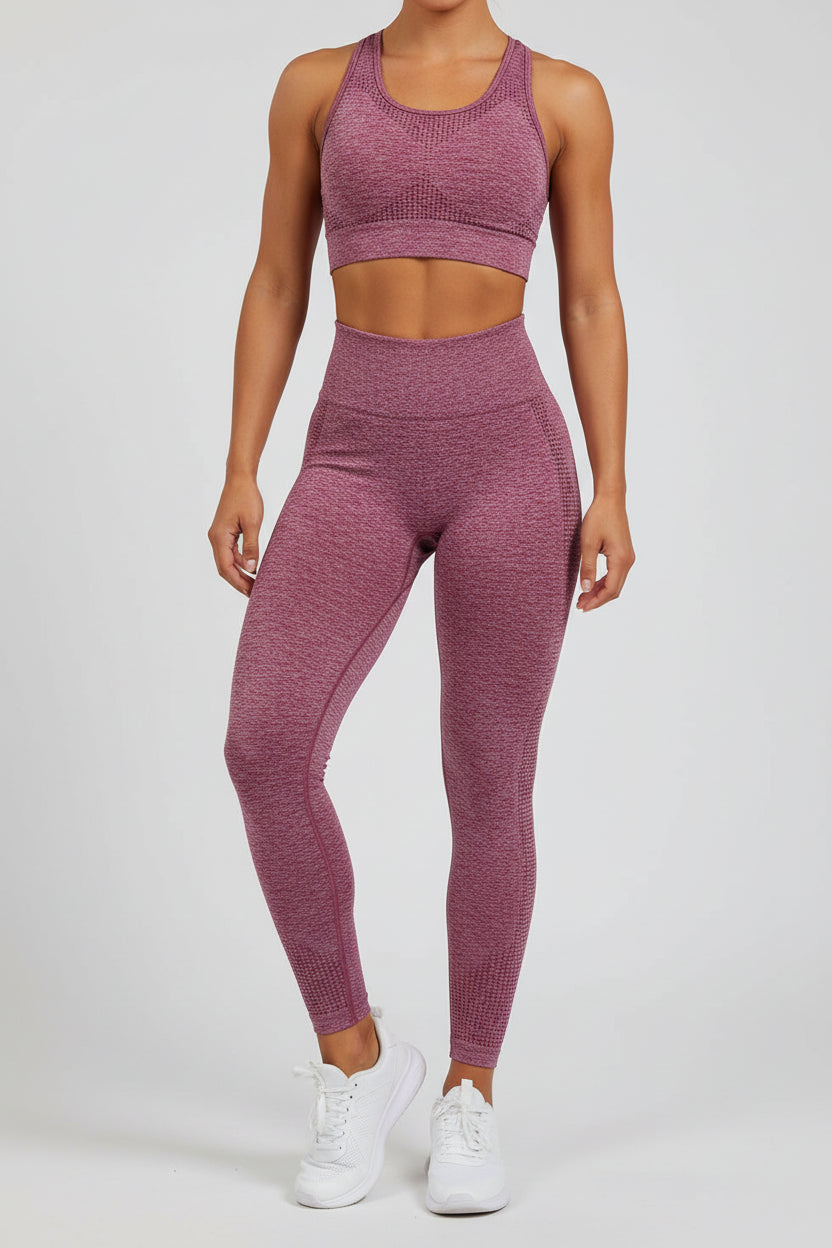 Folded maroon leggings on a light gray background