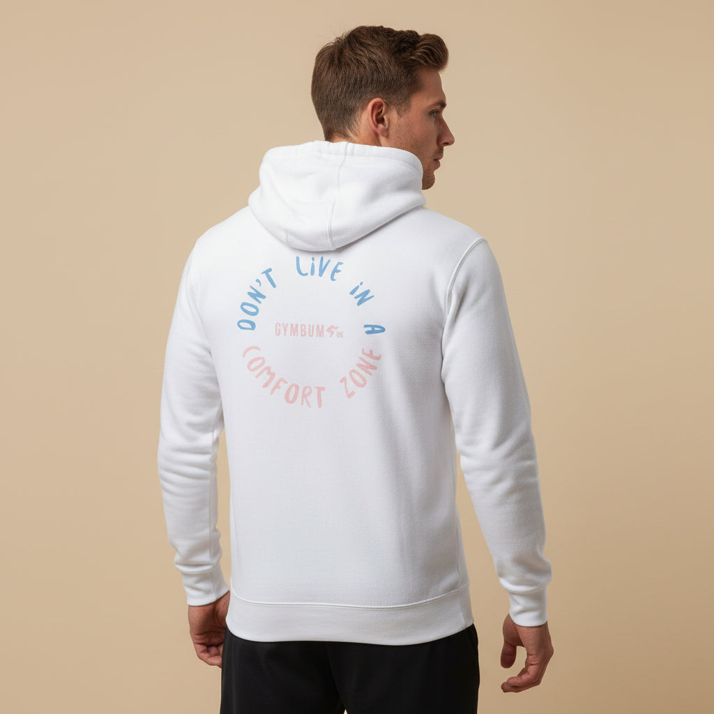 Person wearing a white hoodie with text on the back against a beige background