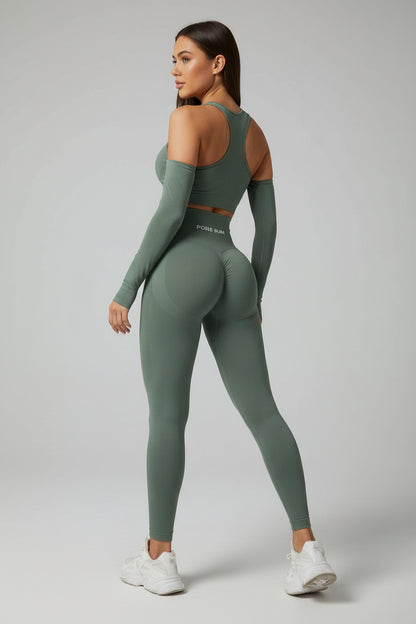 Person wearing a green athletic outfit on a plain background