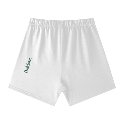 White off-court shorts with elastic waistband and left-leg logo print (back view)