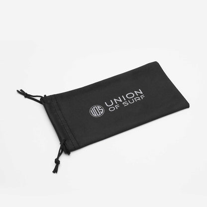 Black fabric eyeglass pouch with drawstring and Union of Surf logo