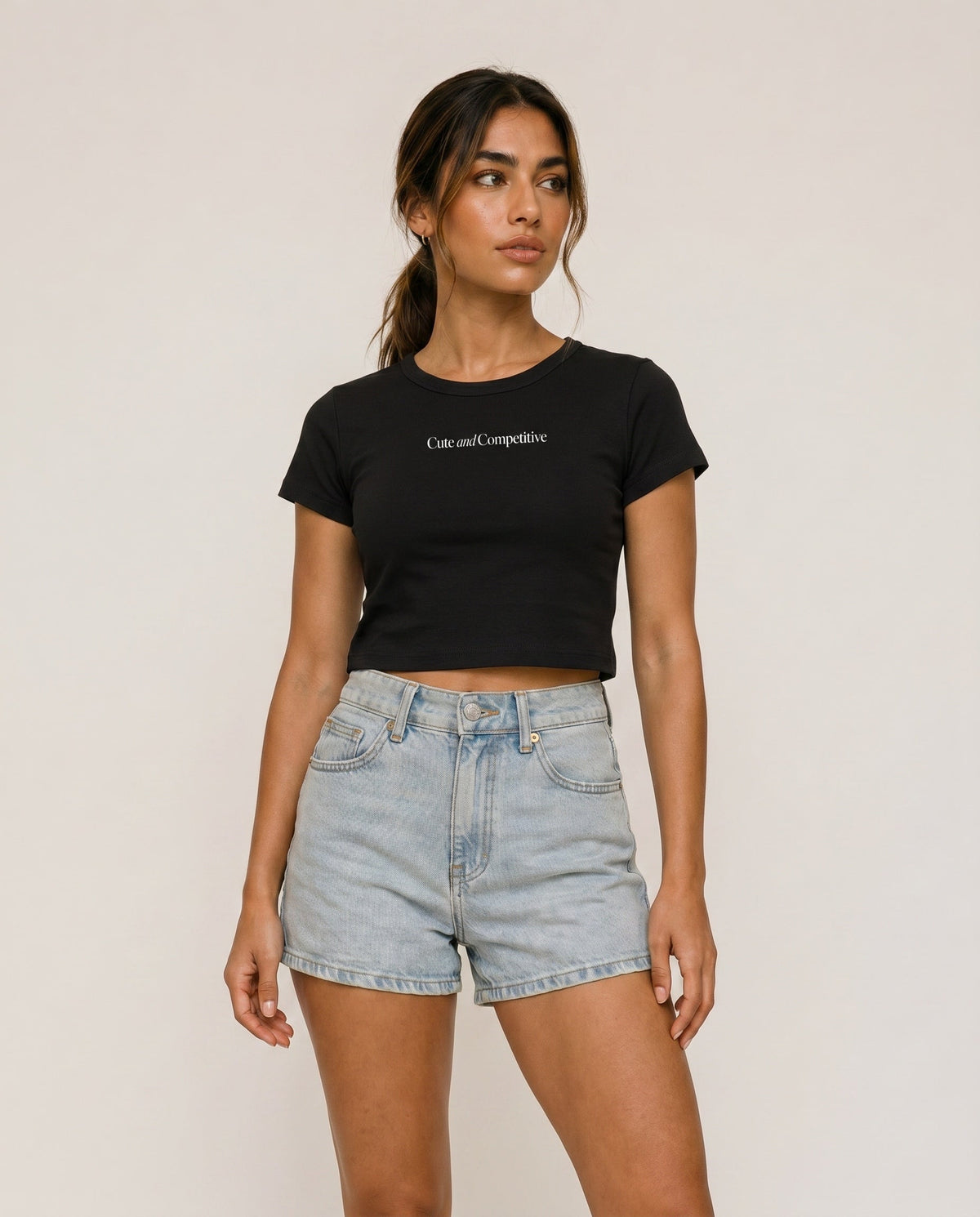 Black cropped T-shirt with crew neck and chest logo