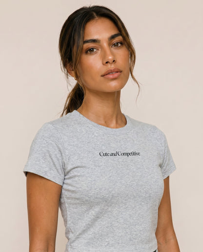 Light gray cropped T-shirt with crew neck and chest logo