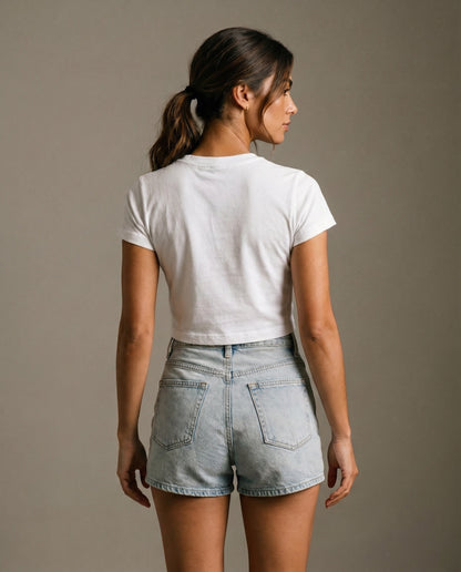 Cropped white T-shirt with crew neck and short sleeves; back view