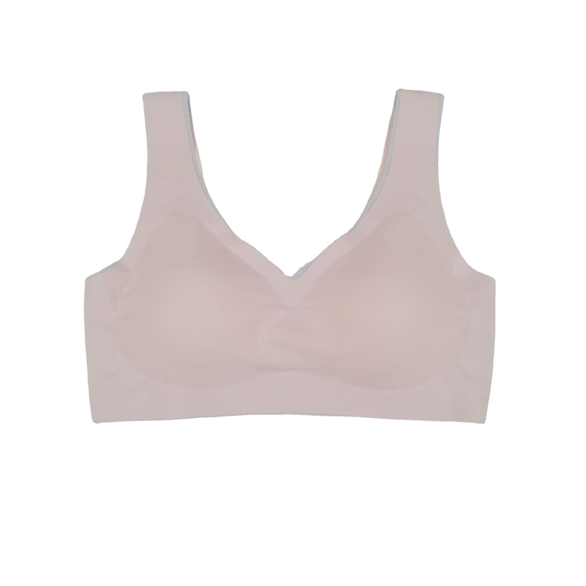 Seamless underwire-free bra in light blush pink with V-neck and smooth cups