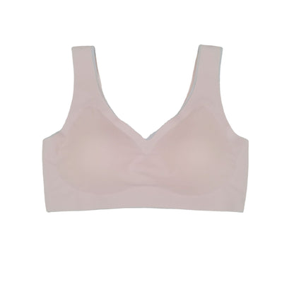 Seamless underwire-free bra in light blush pink with V-neck and smooth cups