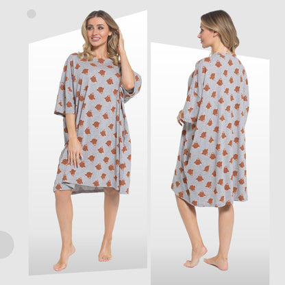 Loose cotton nightdress in light blue-gray with orange cow print; round neck, short sleeves