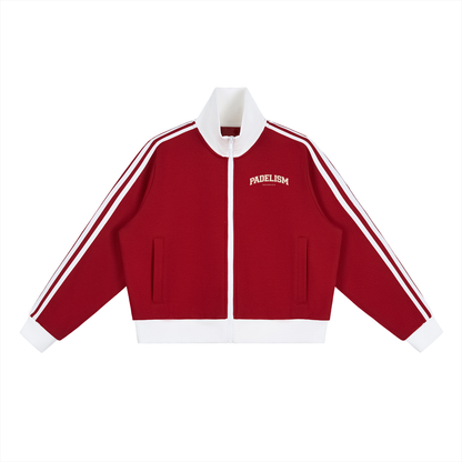 Red track jacket with white trim, zip front, stand collar, PADELISM logo.