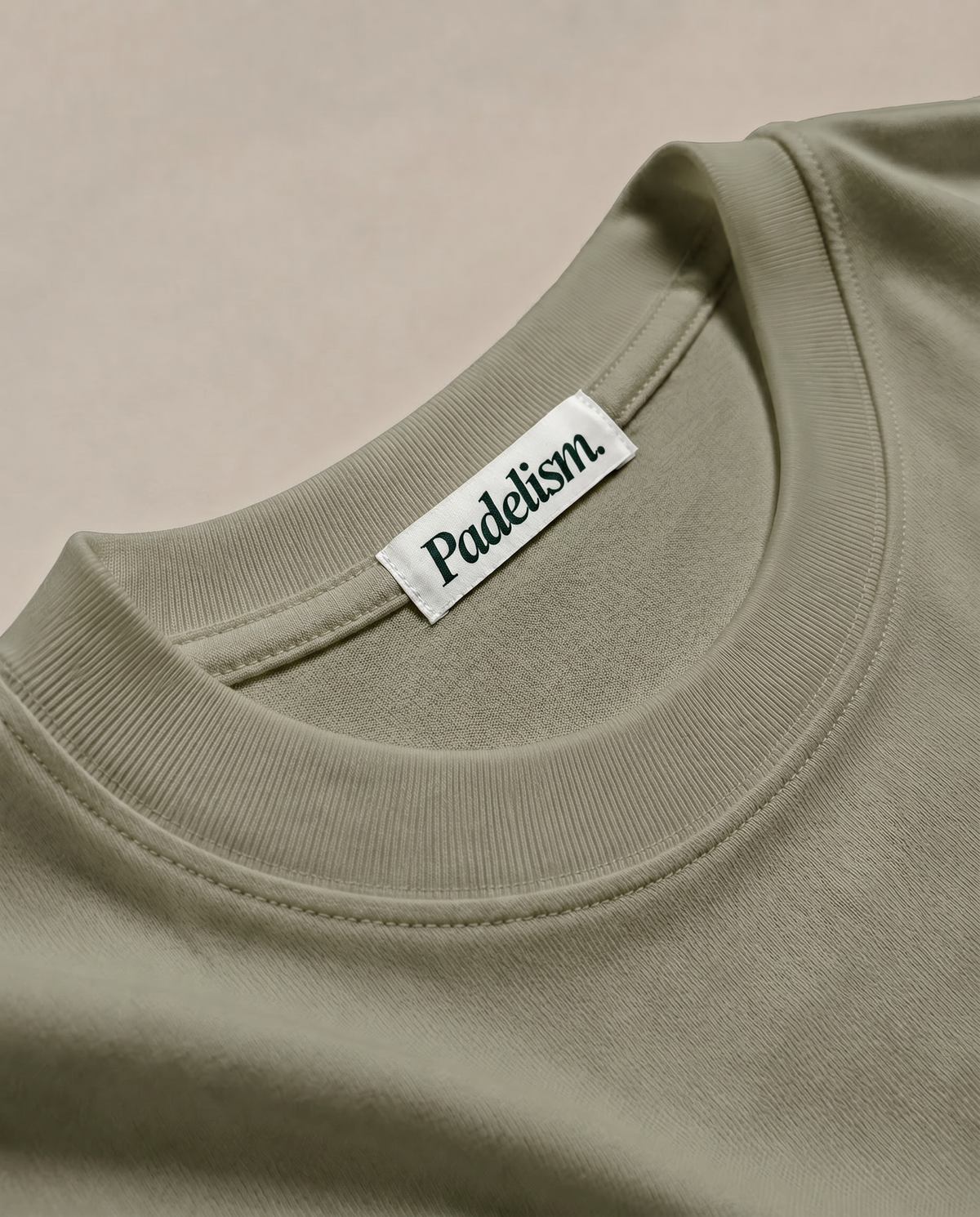 Heavyweight T-shirt in gray-green with crew neck and “Paddleism” neck label