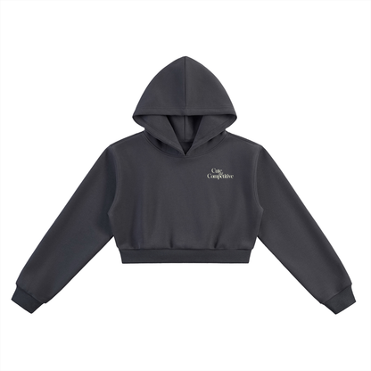 Cropped dark gray hoodie with hood, kangaroo pocket, and small chest logo