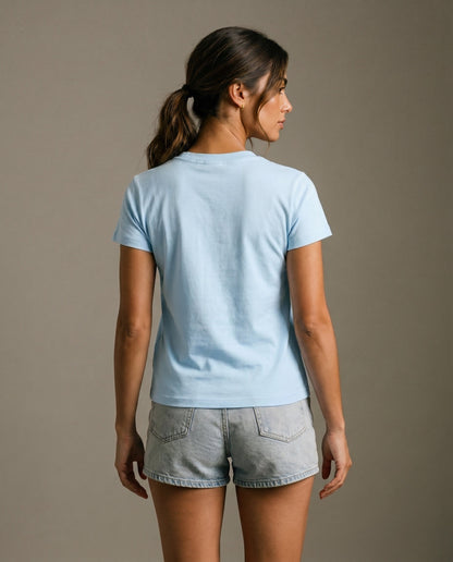 Light blue crewneck t-shirt back view, short sleeves, no visible logo.