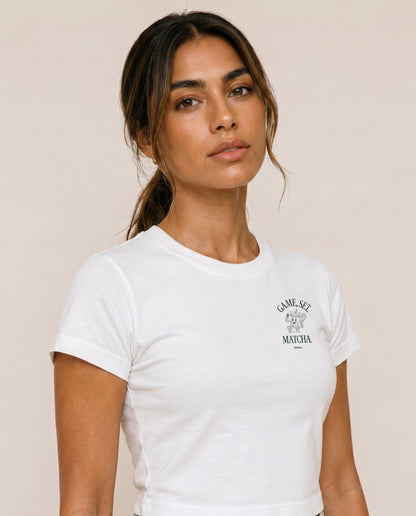 White crewneck T-shirt with chest logo print at center, short sleeves