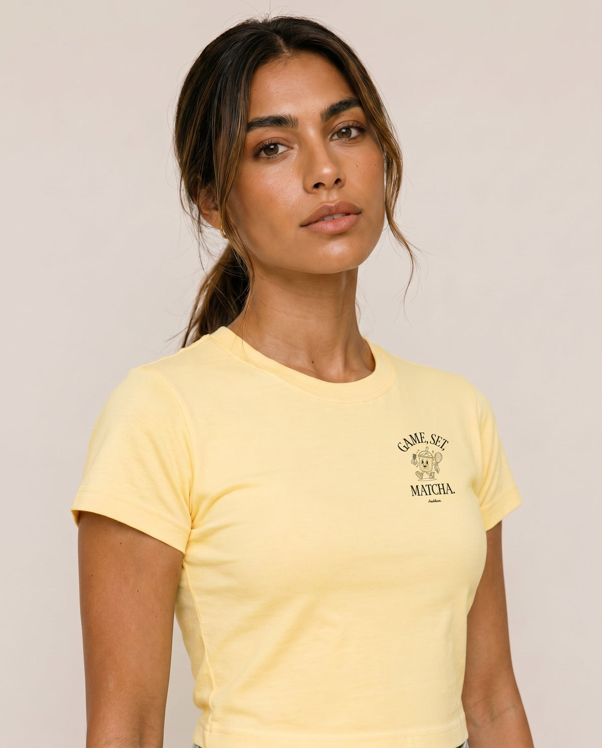 Yellow crewneck T-shirt with chest logo print, short sleeves