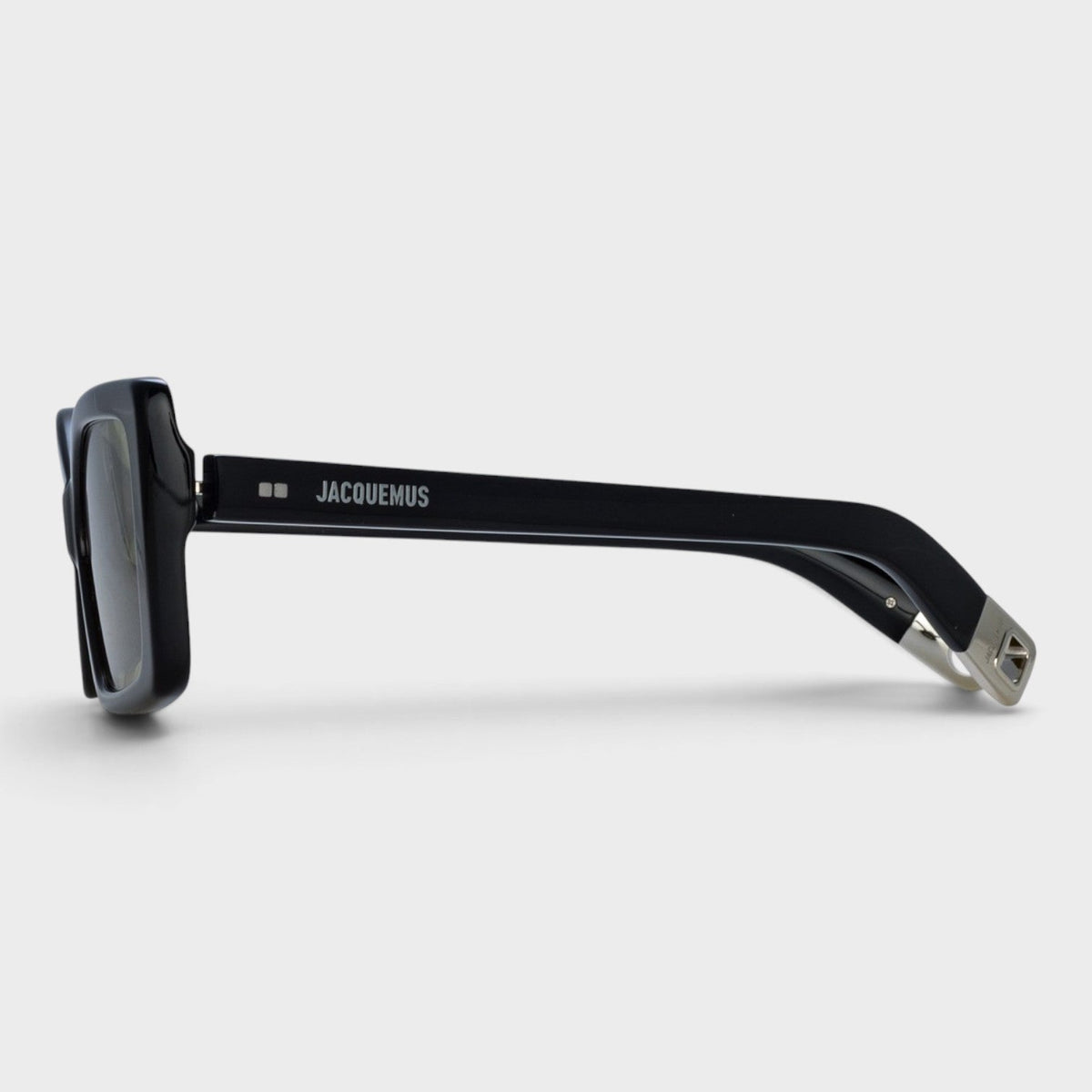Black sunglasses side view with metal hinge and temple logo