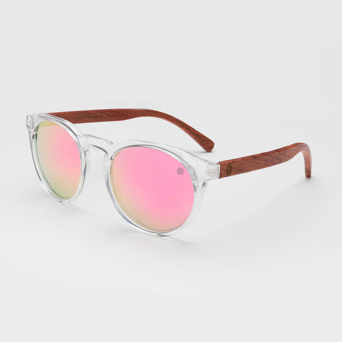 Round sunglasses with clear frame, pink tinted lenses, and brown wooden-style arms