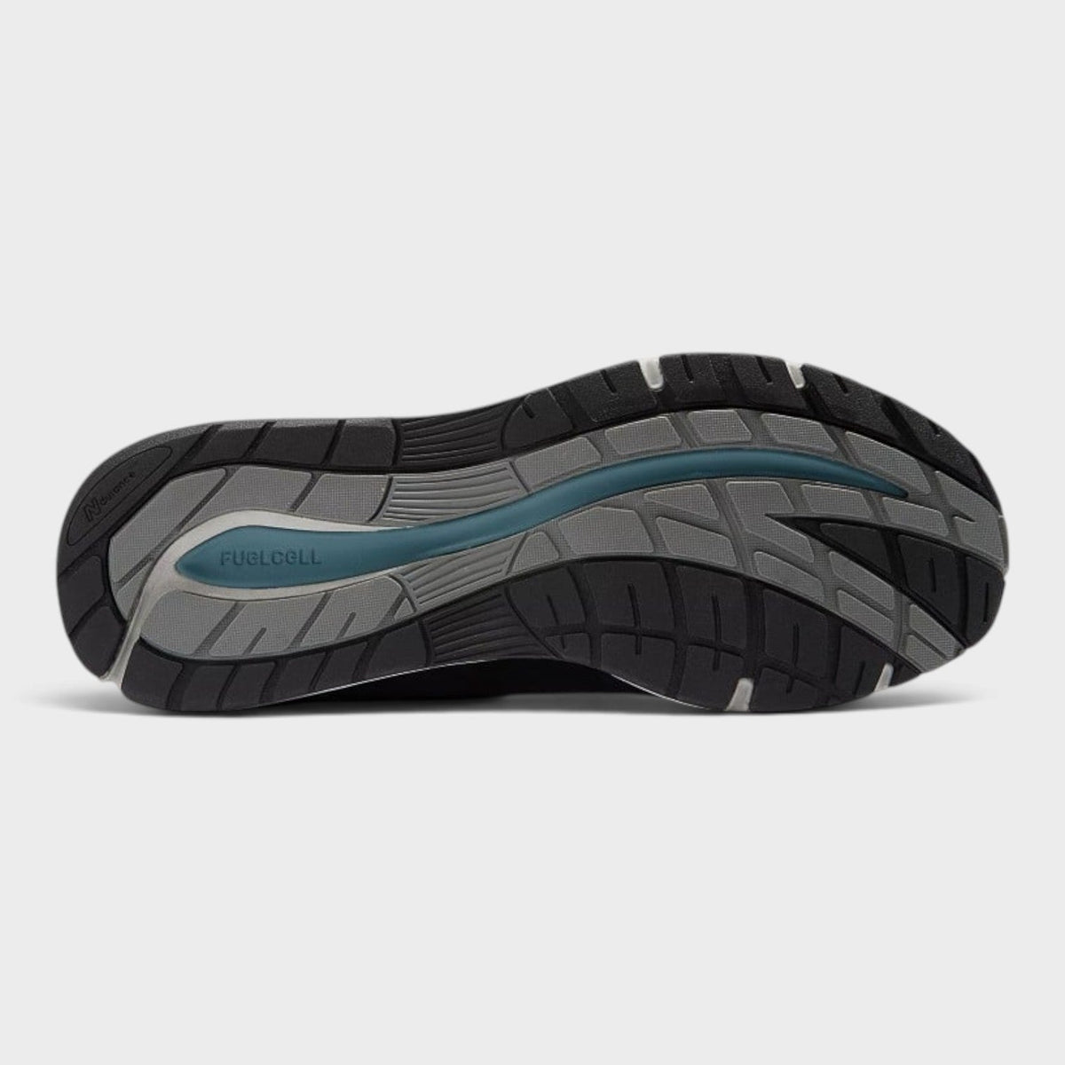 Dark navy 991v2 running sneaker outsole with textured tread and teal accents