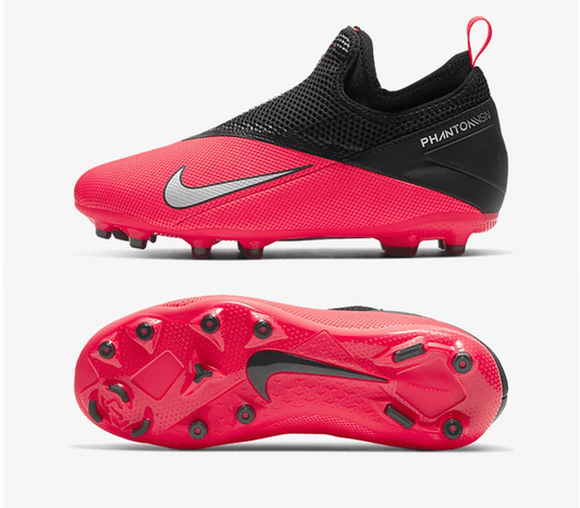 Kids football boots with red upper, black collar, Nike swoosh, and studded outsole