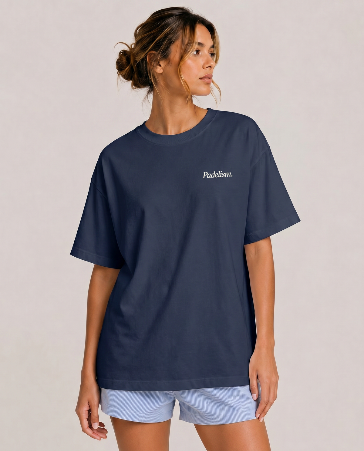 Navy heavyweight T-shirt with Padelism. chest logo, crew neck, short sleeves, side view