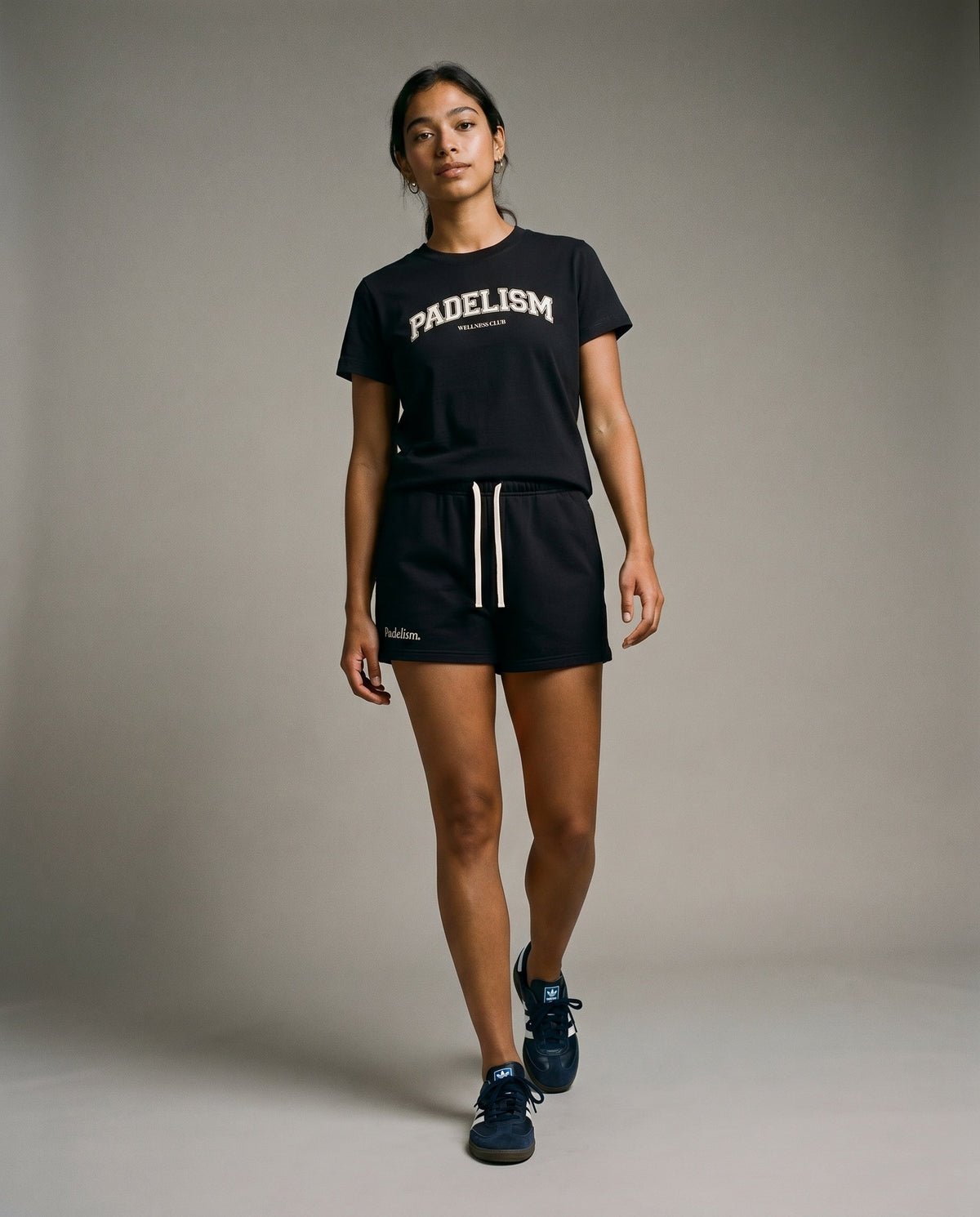 Black Padelism core shorts with elastic waistband and white drawstring
