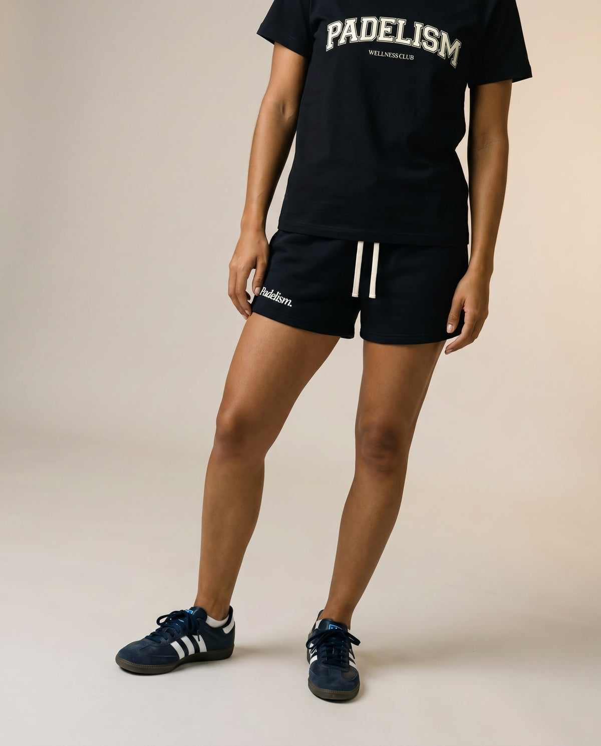 Black Padelism core shorts with drawstring waist and side logo detail