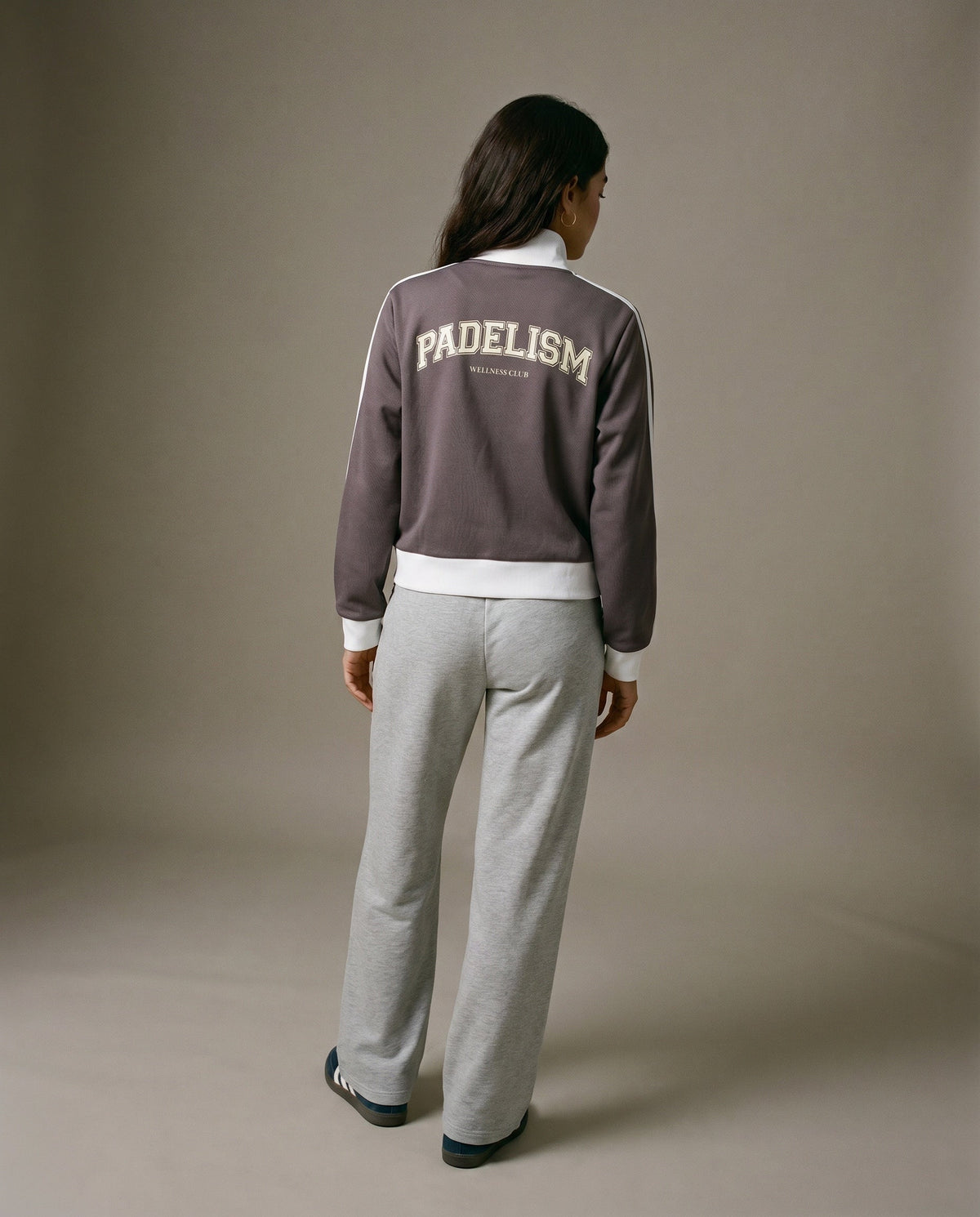 Plum purple track jacket, back view, with Padelism logo and white waist band