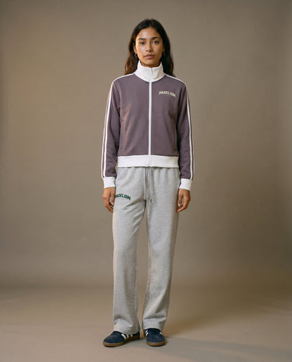 Plum purple track jacket with white zipper and contrast striped sleeves