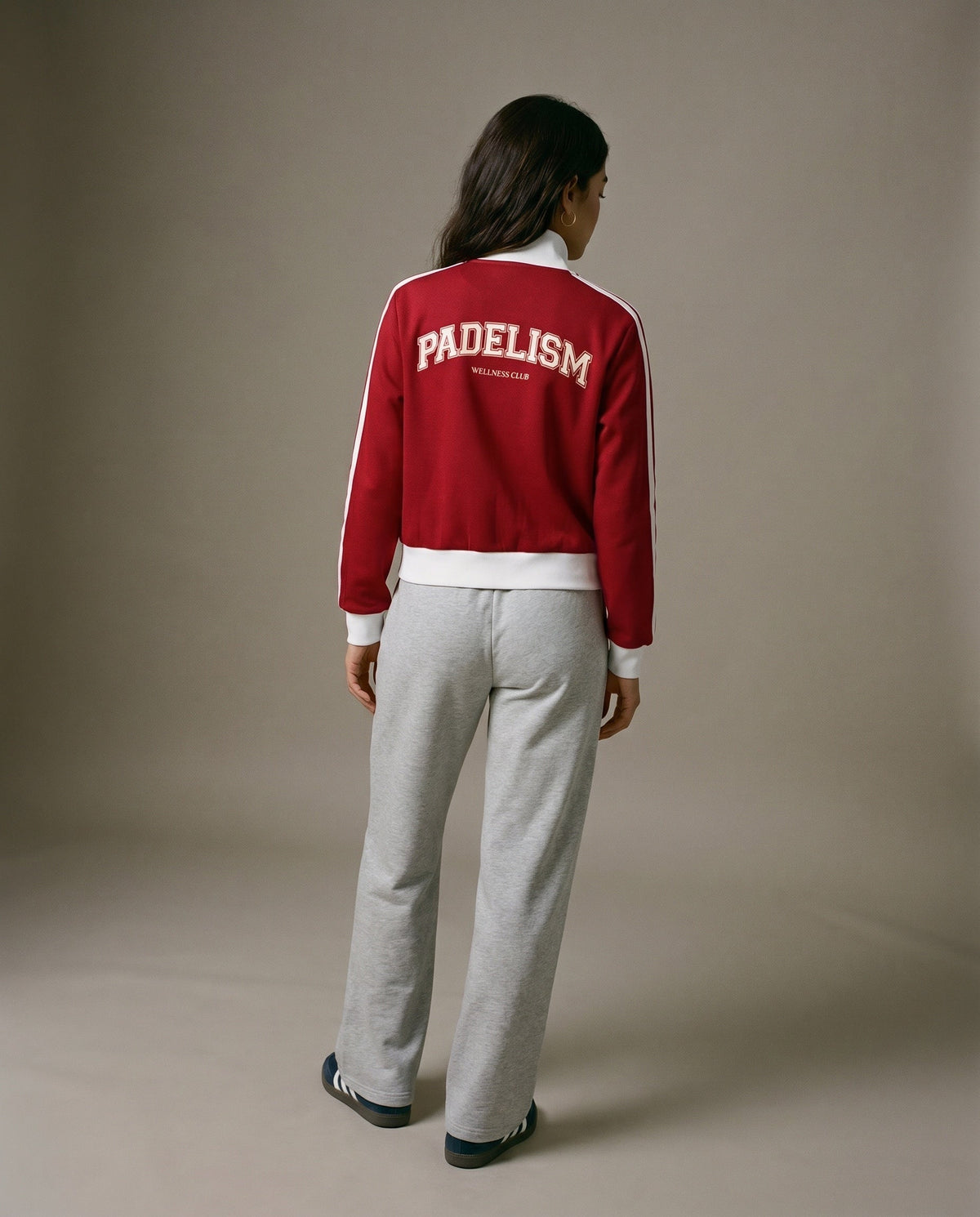 Red track jacket, back view, with Padelism logo and white waist band