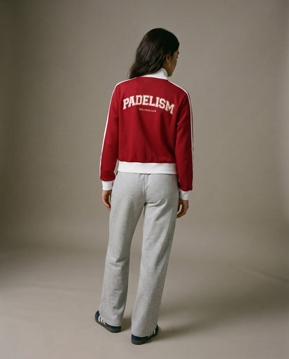 Red track jacket, back view, with Padelism logo and white waist band