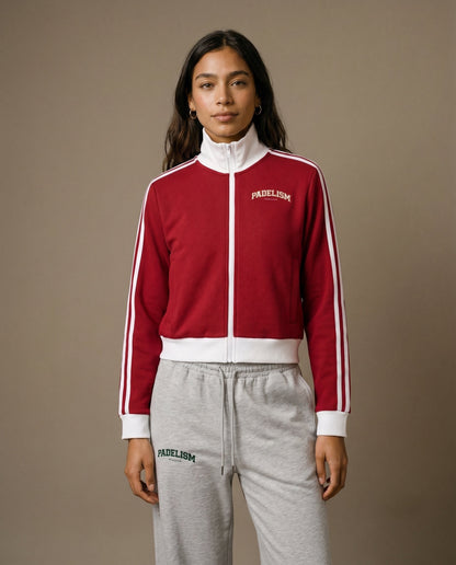 Red track jacket with white zipper, stand collar, and side stripe trims