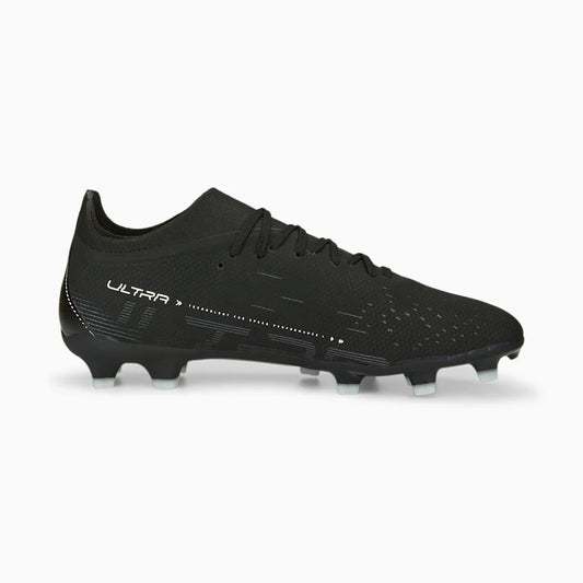 Puma football boots with black upper and FG/AG studded sole
