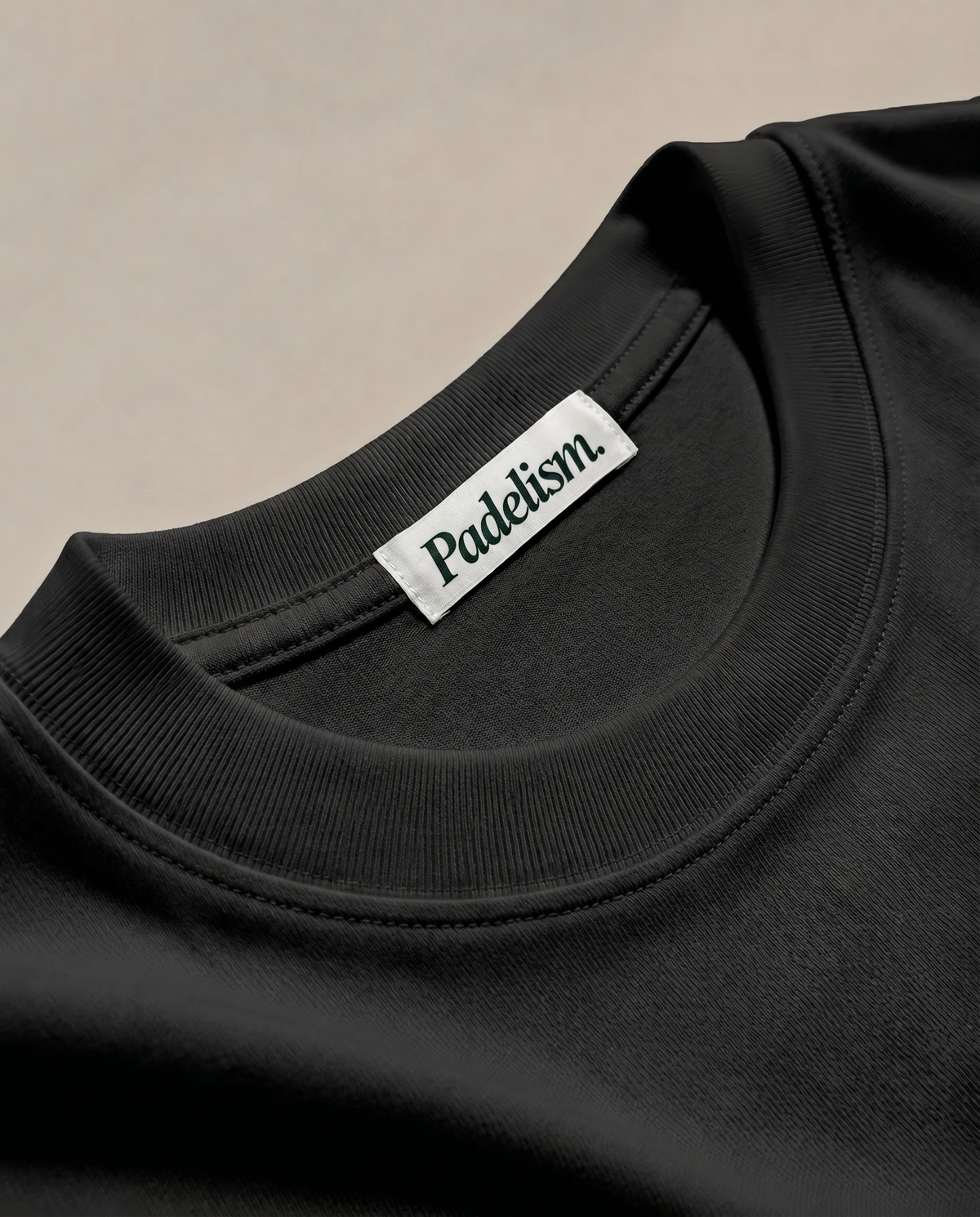 Black heavyweight T-shirt with crew neck and woven brand neck label