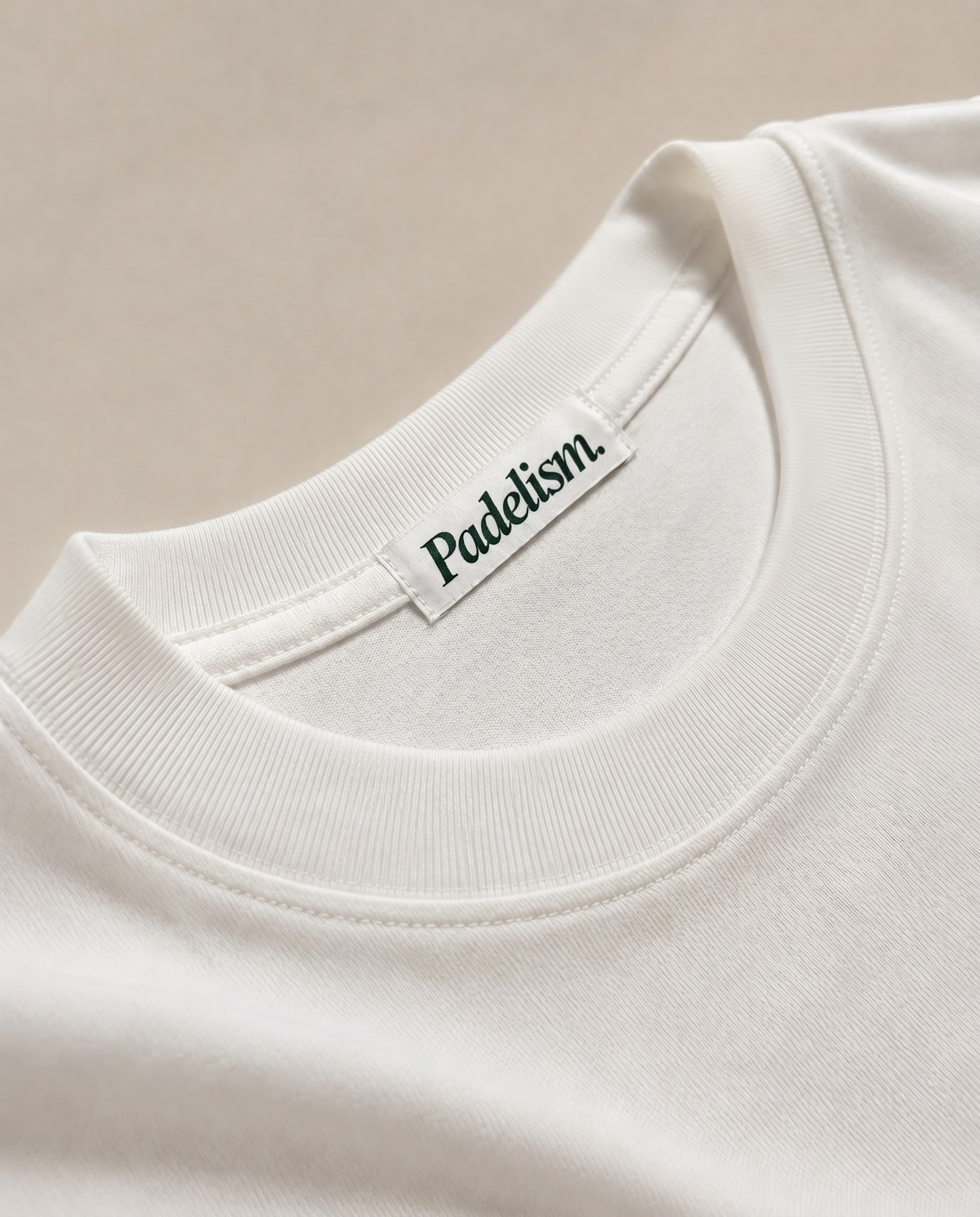 White heavyweight T-shirt with crew neck seam and woven neck brand label
