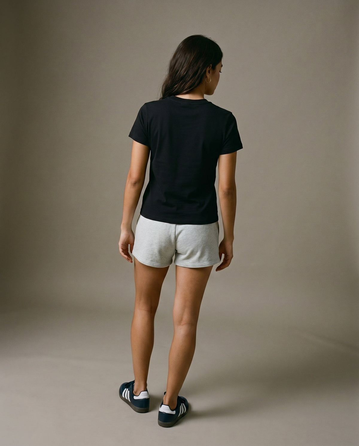 Black crewneck t-shirt, back view with no visible front graphic.