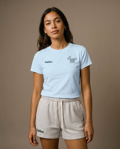 Light blue crewneck t-shirt with left and right chest emblem and text.