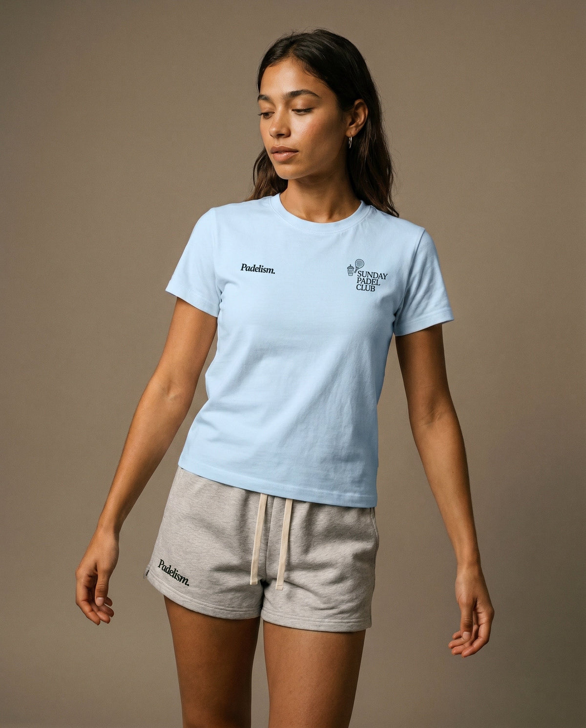 Light blue crewneck t-shirt with chest logo prints, front view.