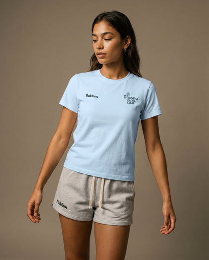 Light blue crewneck t-shirt with chest logo prints, front view.