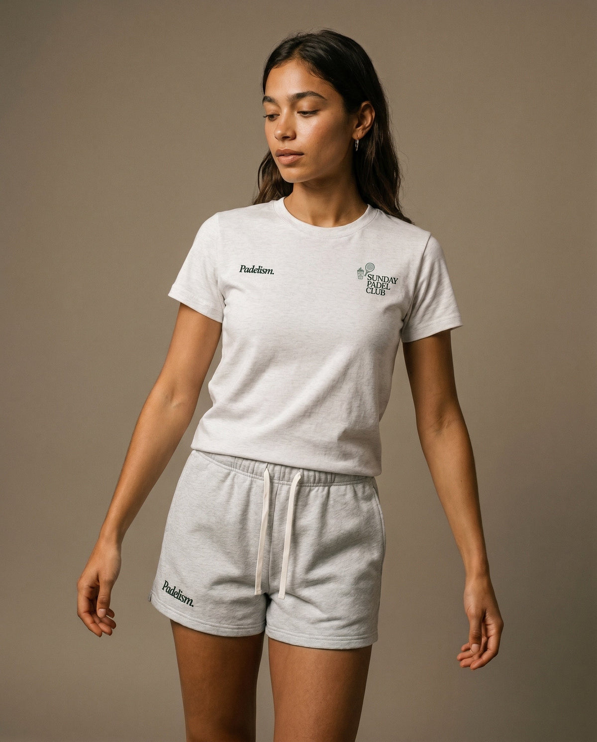 White crewneck t-shirt with small chest logo prints on the front.