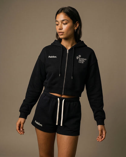 Black cropped zip-up hoodie and matching drawstring shorts set, side view